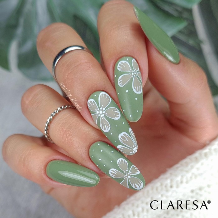 Zielony manicure hybrydowy z wzorami. Użyte kolory lakierów hybrydowych: Gray 205, Green 801